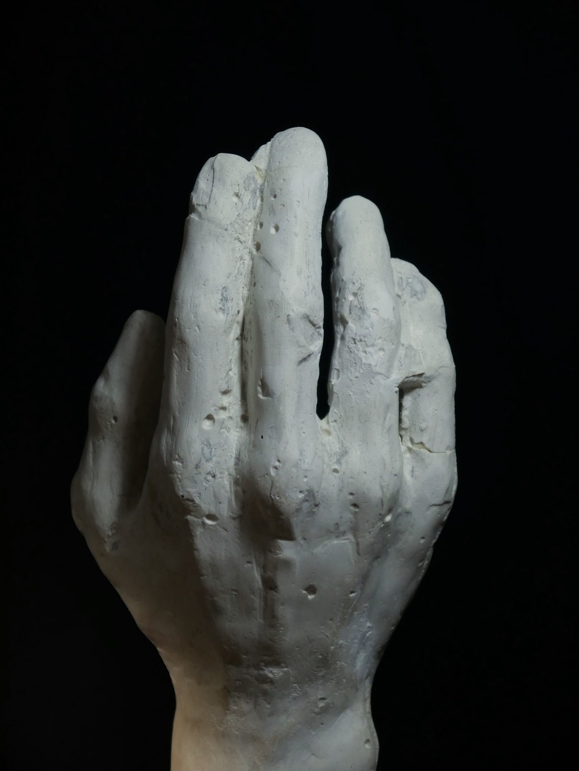 Artist's hand plaster expressionistic sculpture